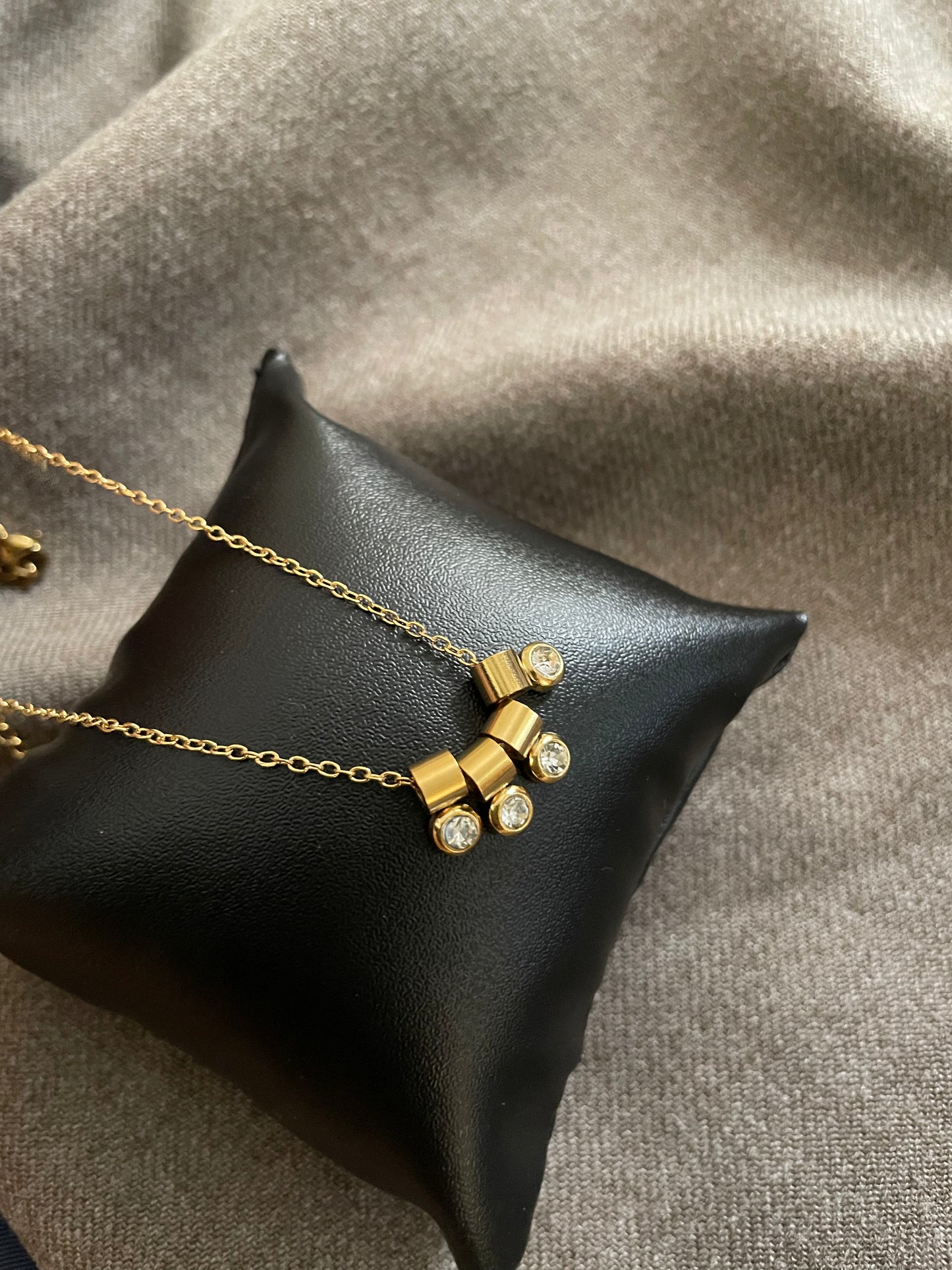 Rolling stone necklace