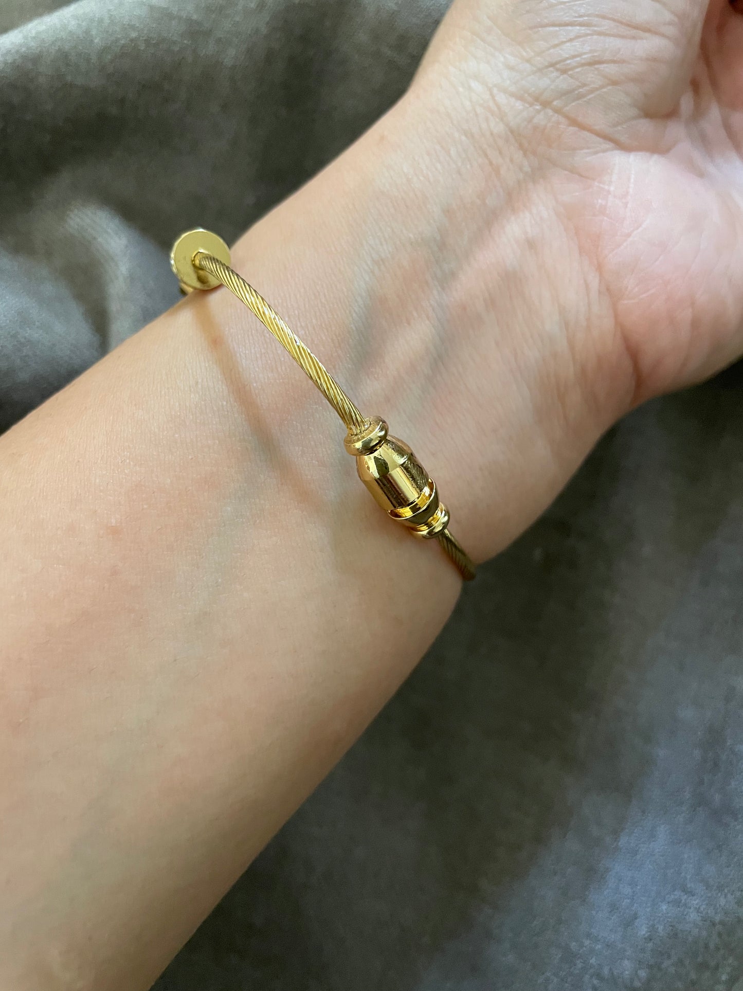 Evil eye gold cable bangle