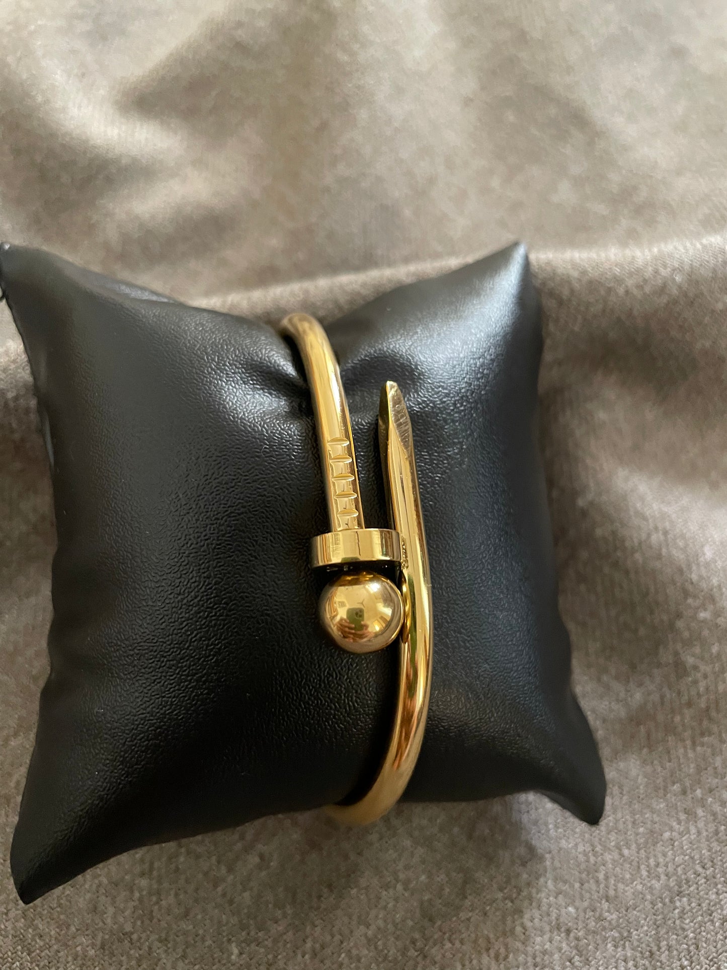 Golden nail bangle