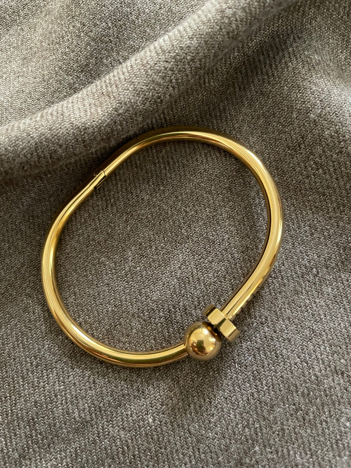 Golden nail bangle