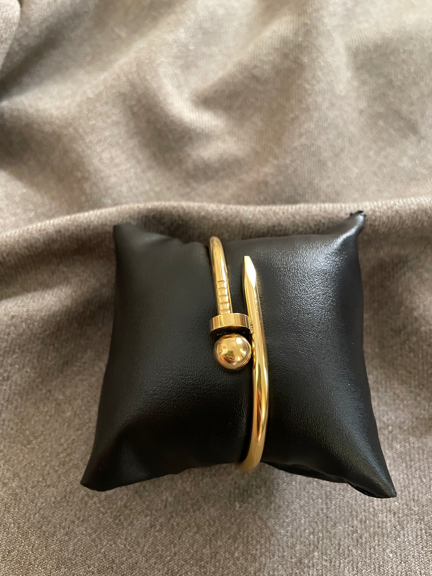 Golden nail bangle