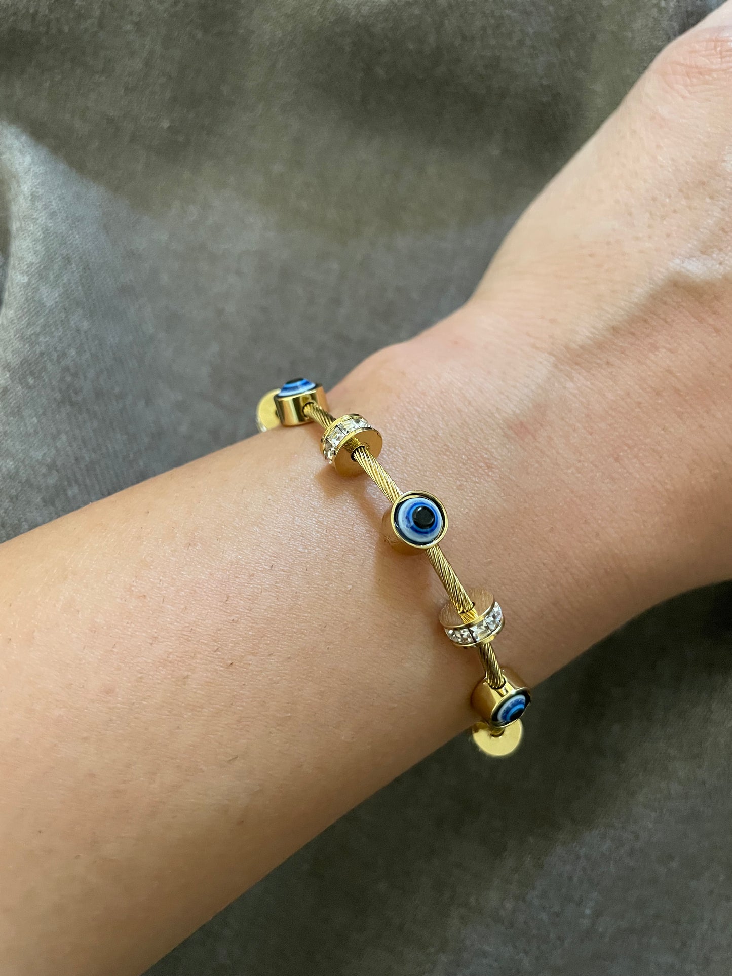 Evil eye gold cable bangle