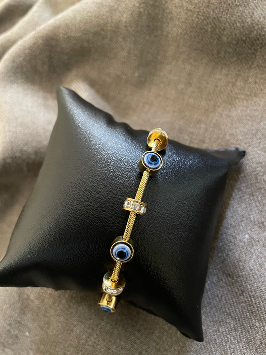 Evil eye gold cable bangle