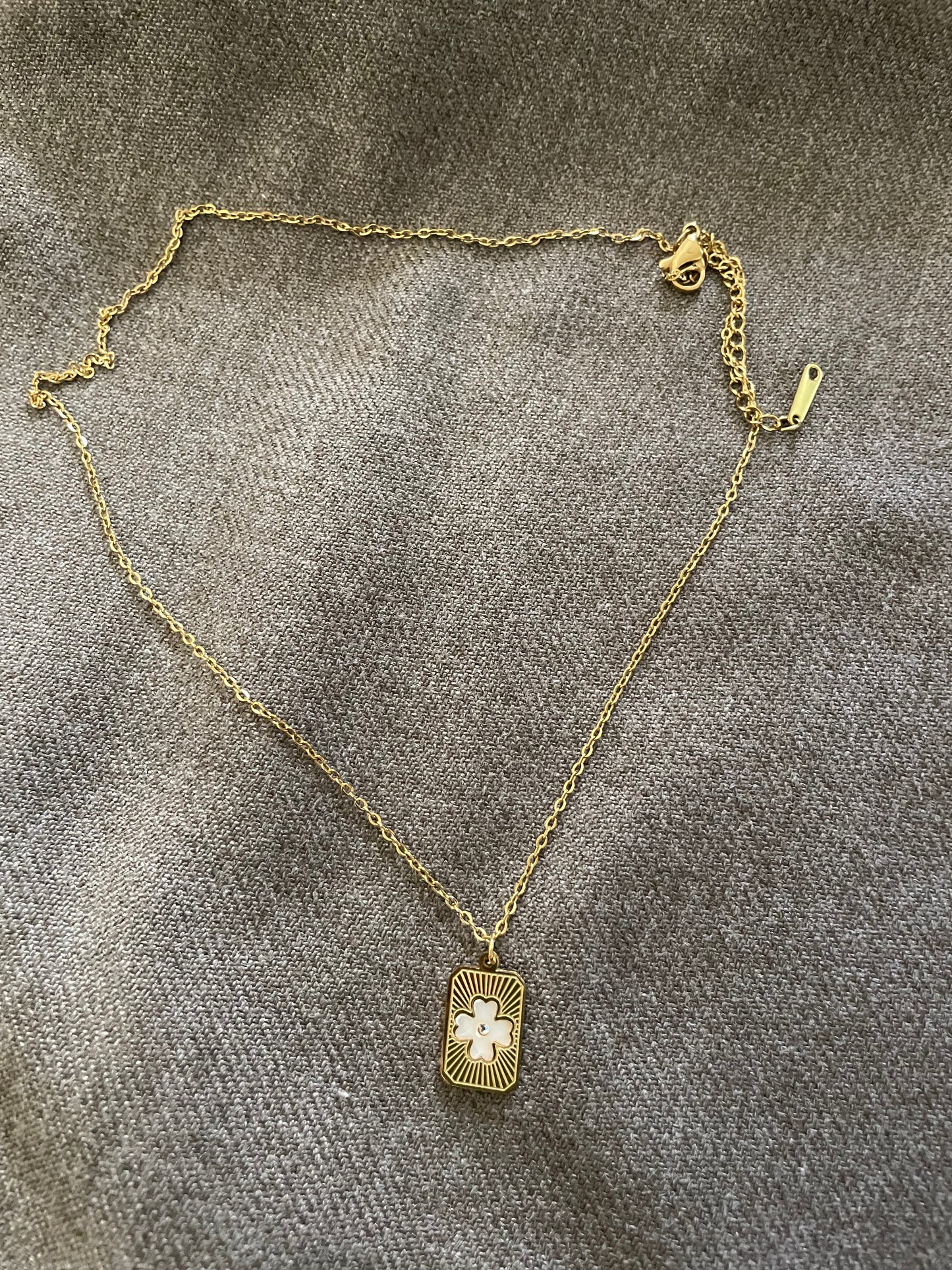 White radiant clover necklace