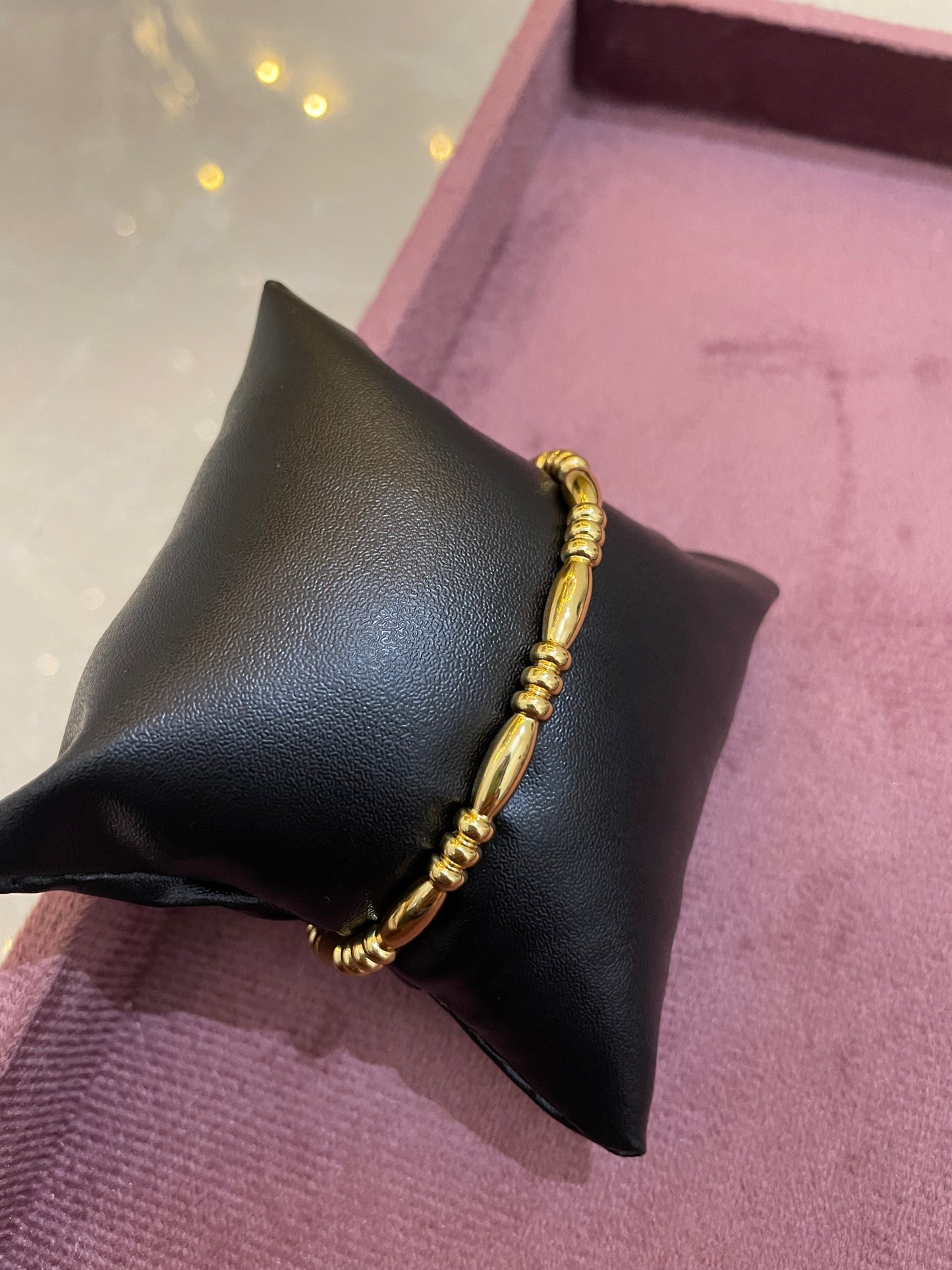 Regal Barrel Bead Gold Bangle