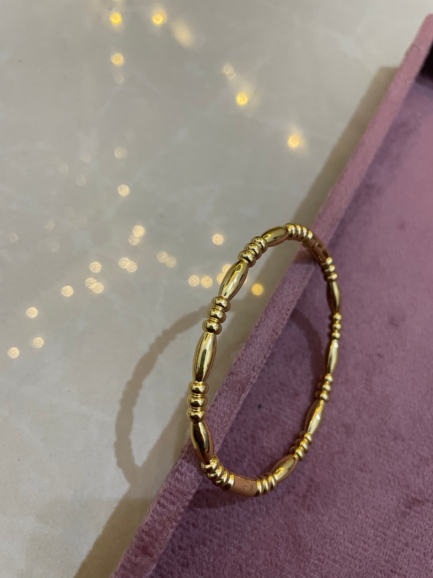 Regal Barrel Bead Gold Bangle