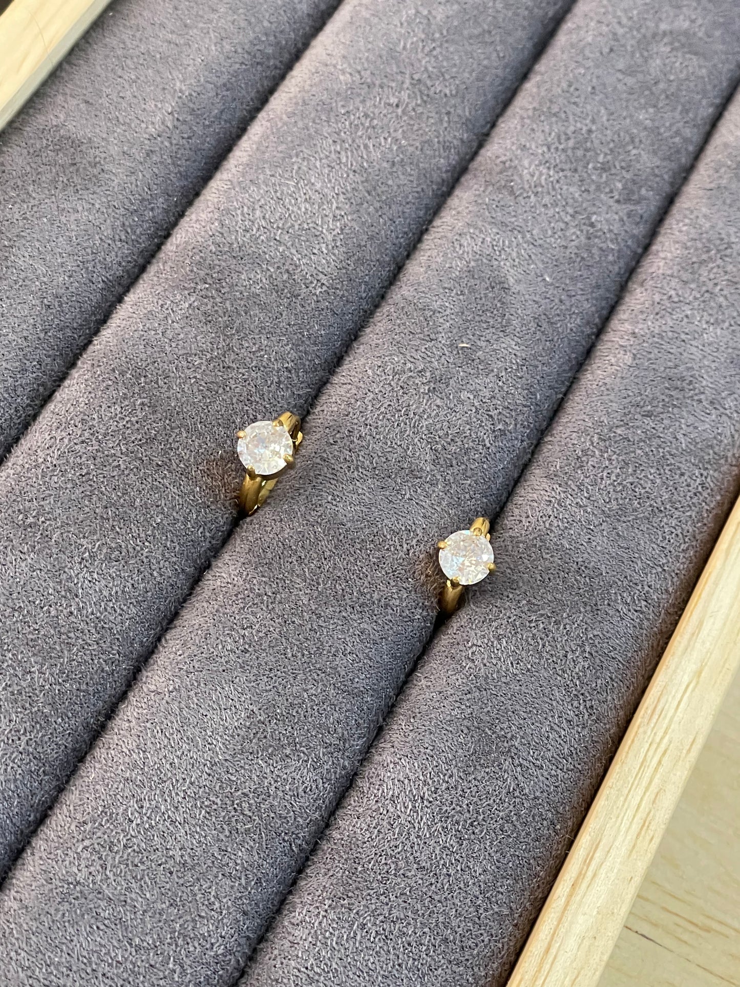 Solitaire Huggie Hoop Earrings.