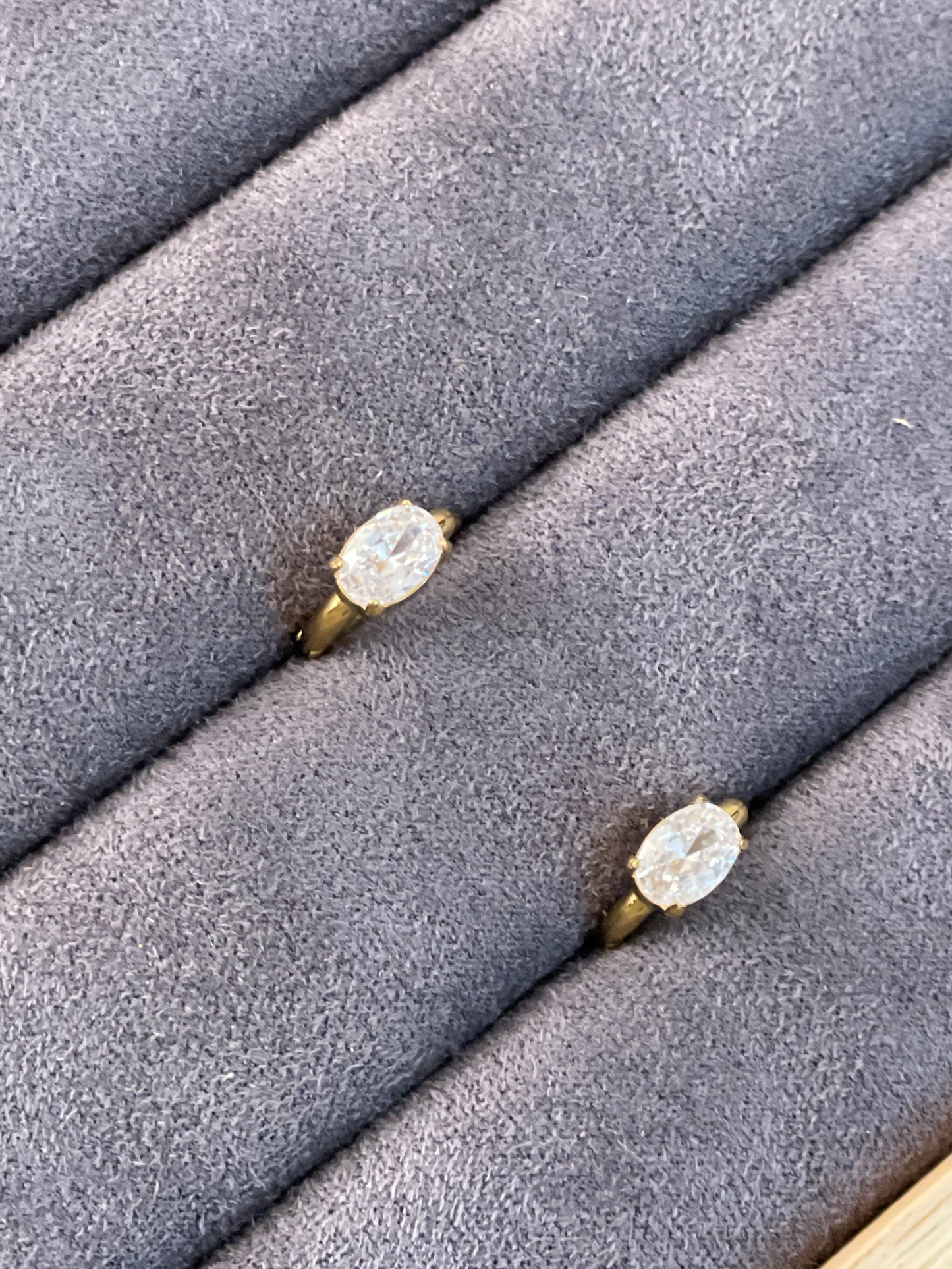 Solitaire Huggie Hoop Earrings.