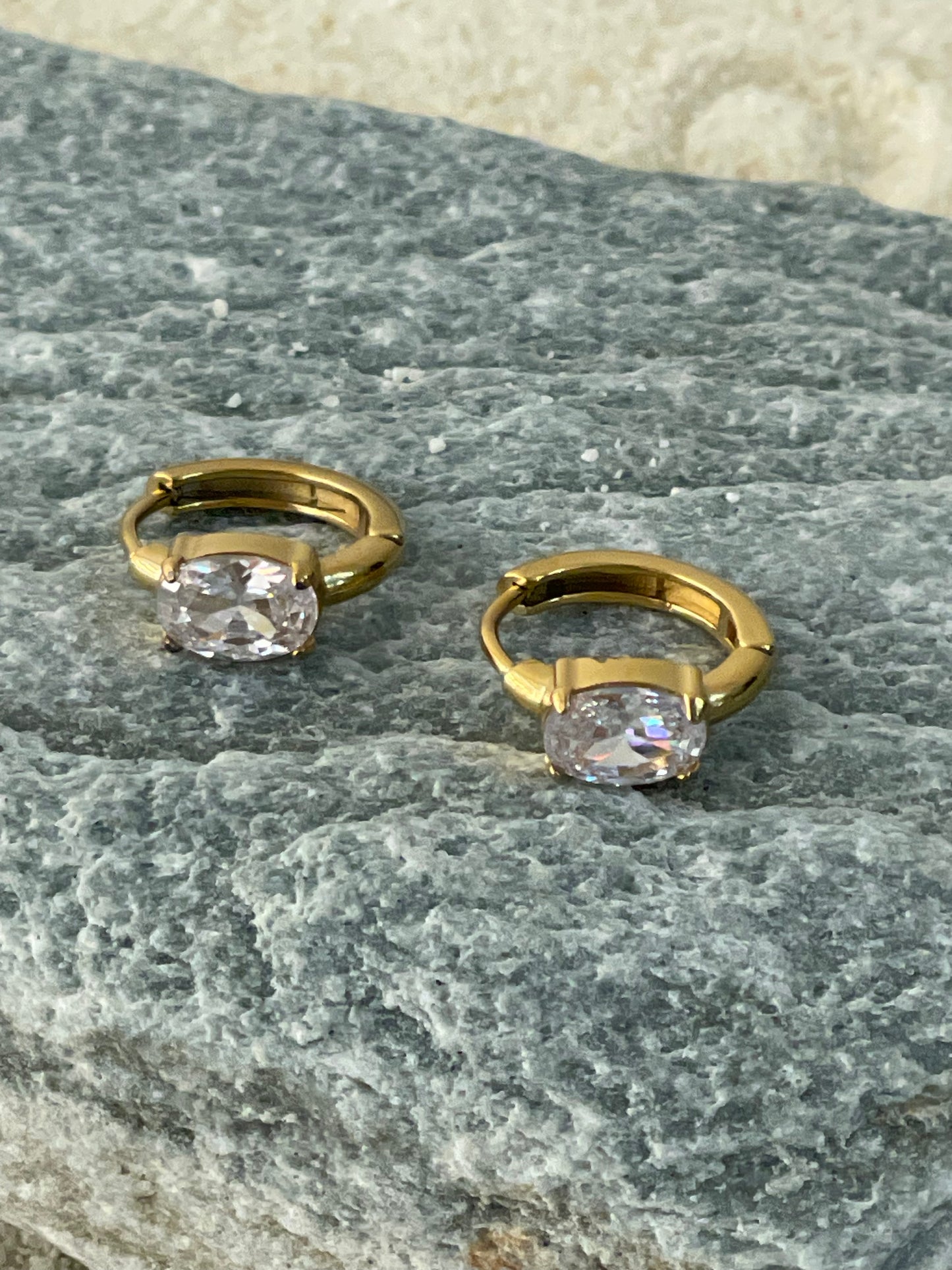 Solitaire Huggie Hoop Earrings.